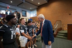 Marietta football team gets City Hall sendoff before London trip