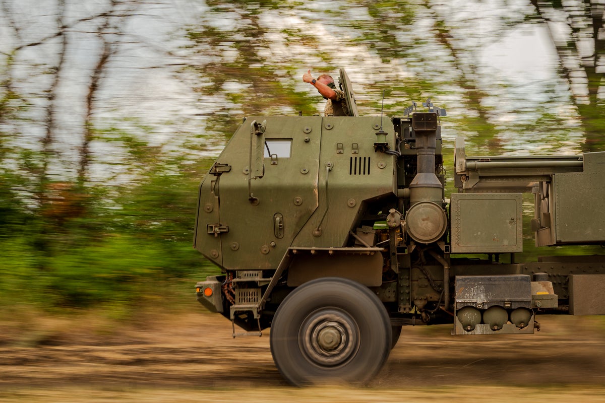 Ukrainian HIMARS crew fires and moves on as it tries to avoid detection, in photos