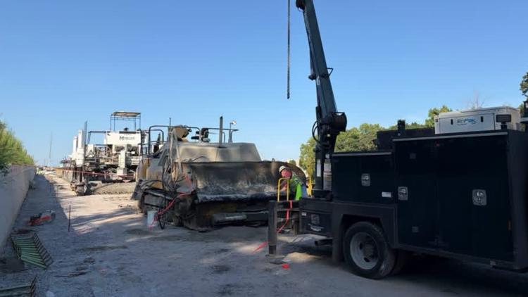 Surgical team, firefighters work for nearly 2 hours to free construction worker trapped in heavy machinery