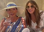Joan Collins, 93, jokes she's 'spending all Elizabeth Hurley's money' as they enjoy lunch in St Tropez with Damian and Billy Ray Cyrus