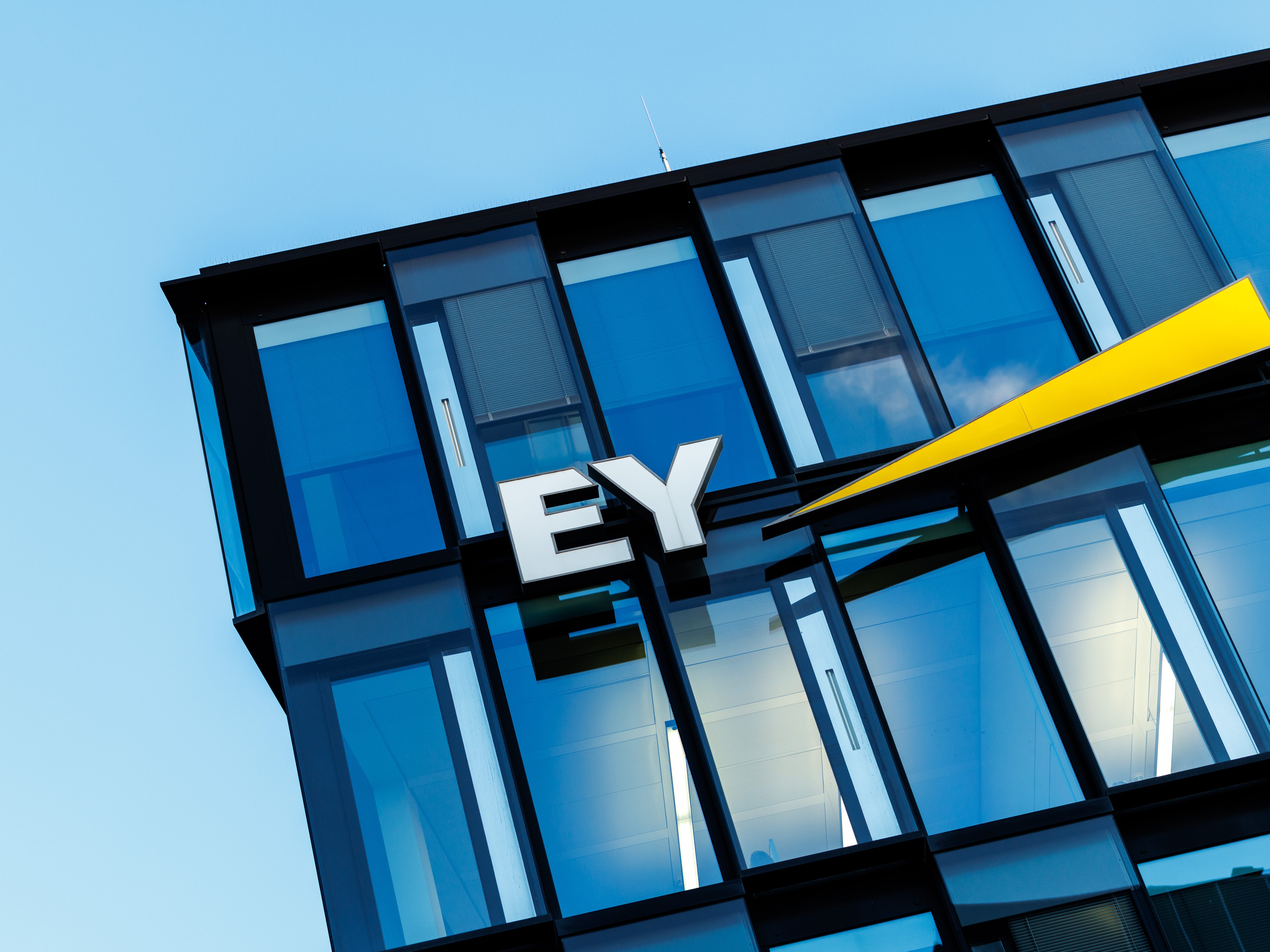 EY is creating a 'value realization' office to make sure its AI spending pays off