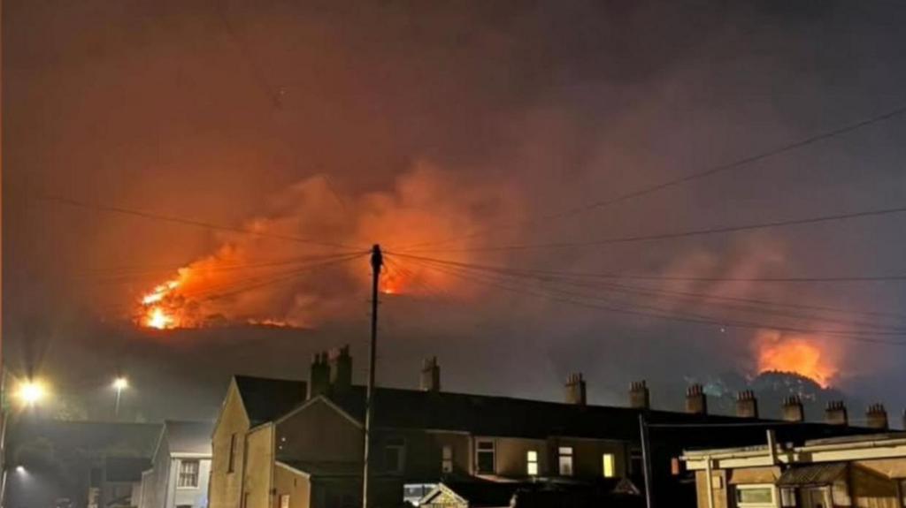 Military and helicopter deployed to fight wildfires