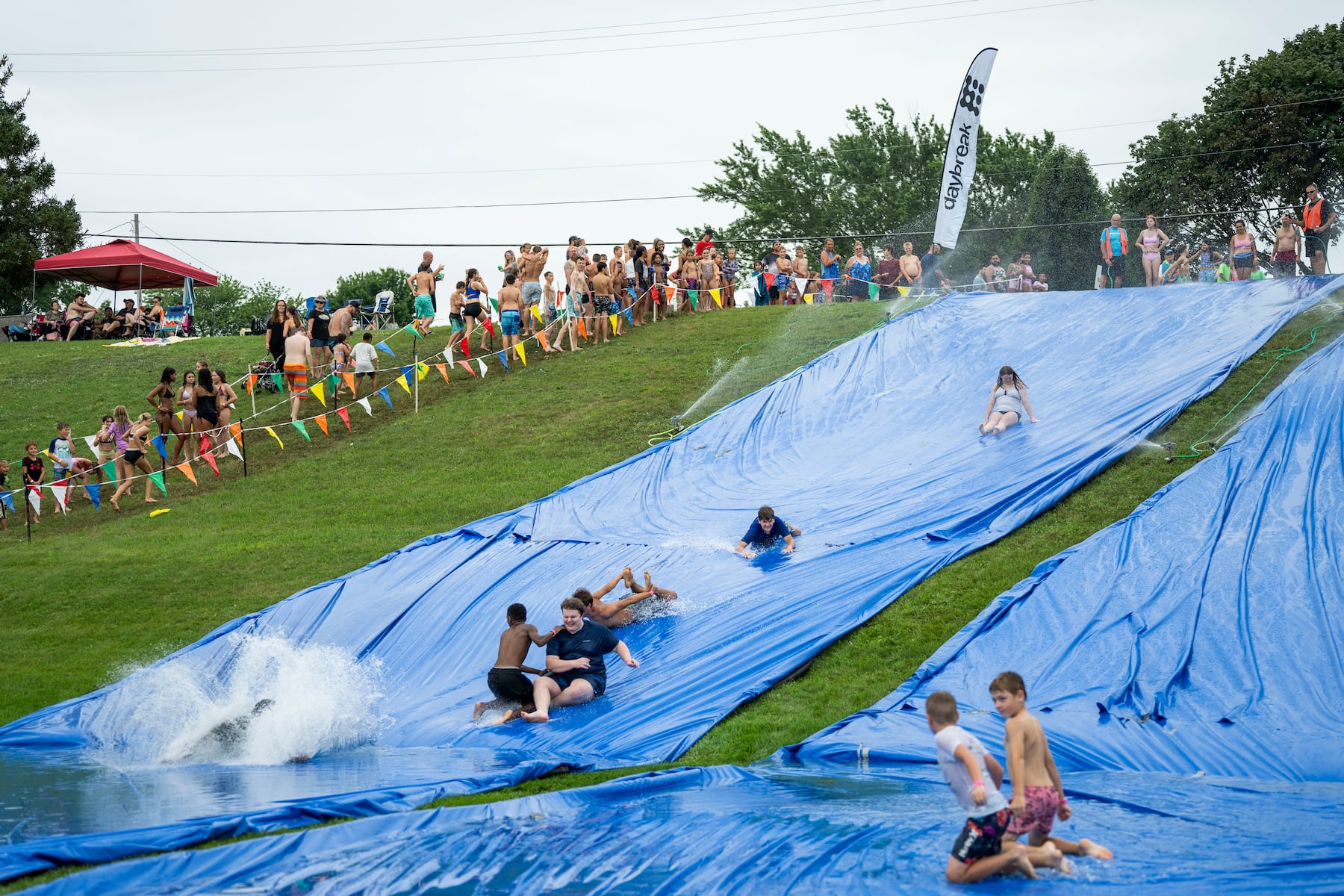 A West Michigan summer staple: Families enjoy 400 feet of Slip ‘N Slides