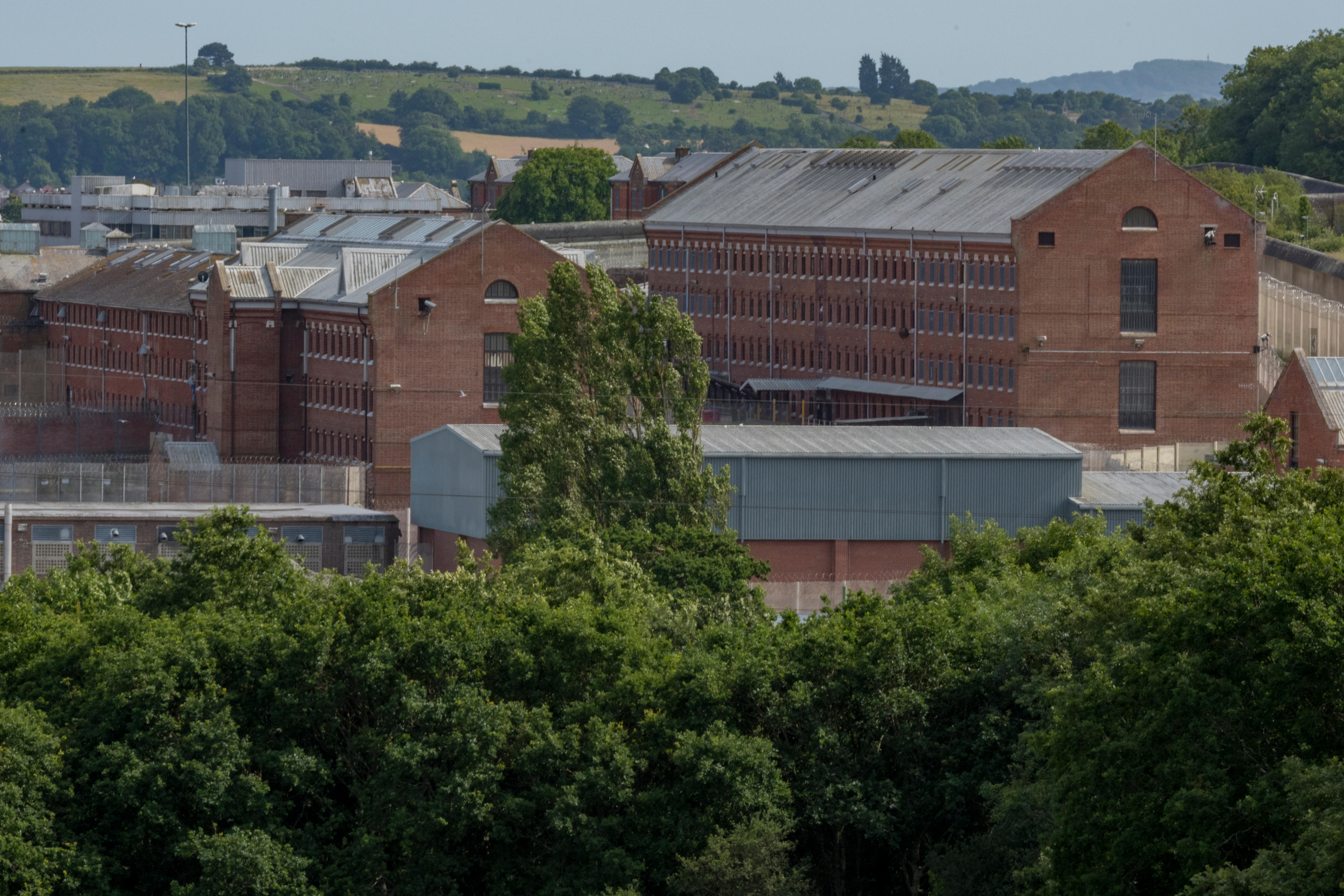 Prison psychologist who sent inmate a topless snap of herself ALLOWED to return to work