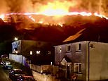 'Appalling' wildfire rages near people's homes in Wales as 200 soldiers are deployed to help firefighters