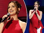 Pregnant Anne Hathaway, 43, covers baby bump in quirky red look at Disney event... after being roasted over maternity style
