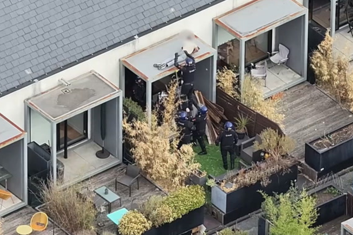 Watch: Police pull sleeping man from Salford roof in dramatic arrest
