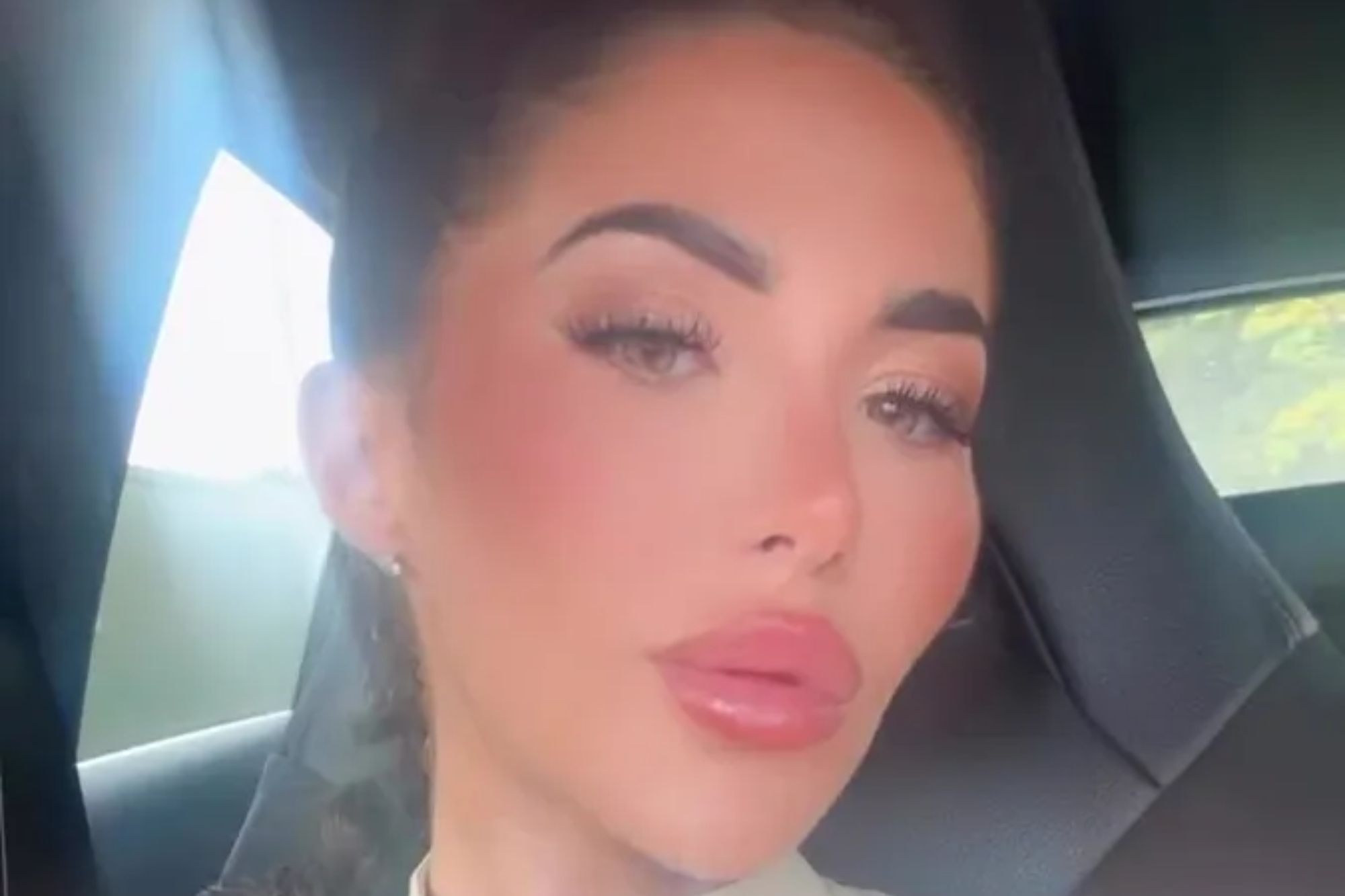 Chloe Brockett shows off results of her boob job in plunging top after hard-launching new romance