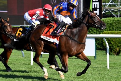 For ladies weekend in horse racing, fillies beat males in 2 big races