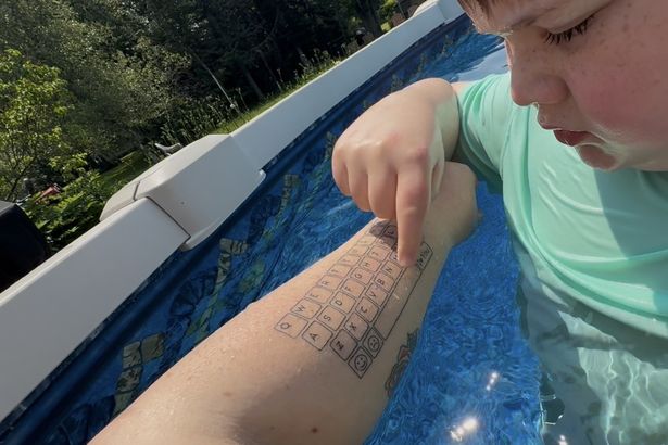 I got keyboard tattooed on arm for my autistic son - his first words left me in tears