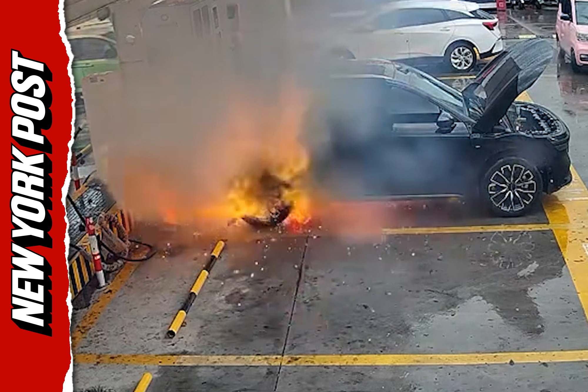 Moment EV erupts in flames and explodes while charging