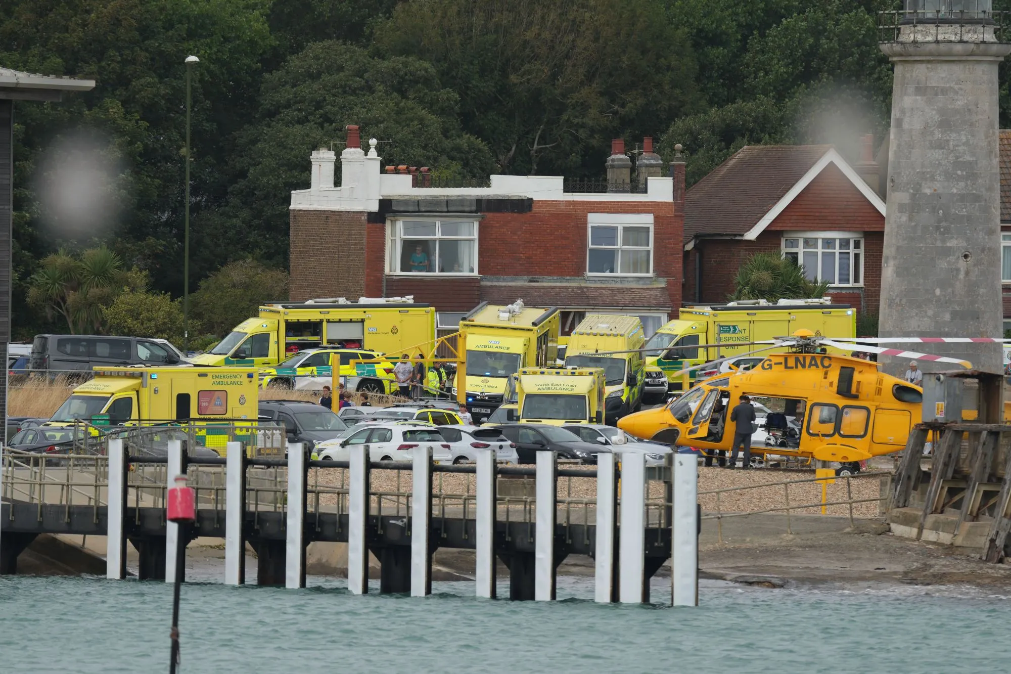 Four people ‘in difficulty’ in sea on UK beach – as air ambulance and emergency crews swoop on scene