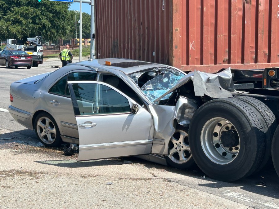 Tractor-trailer crash causes heavy damage at Norfolk intersection