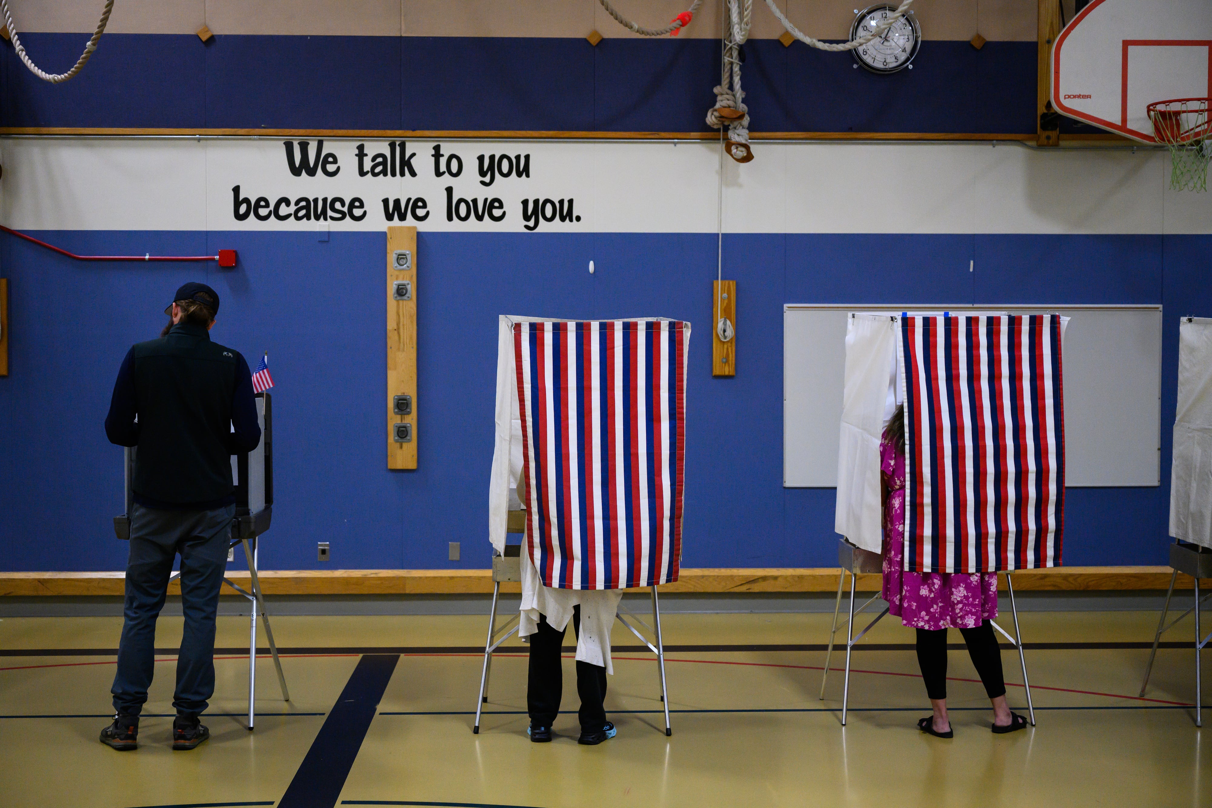 In photos: Candidates compete for attention in Anchorage on primary election day