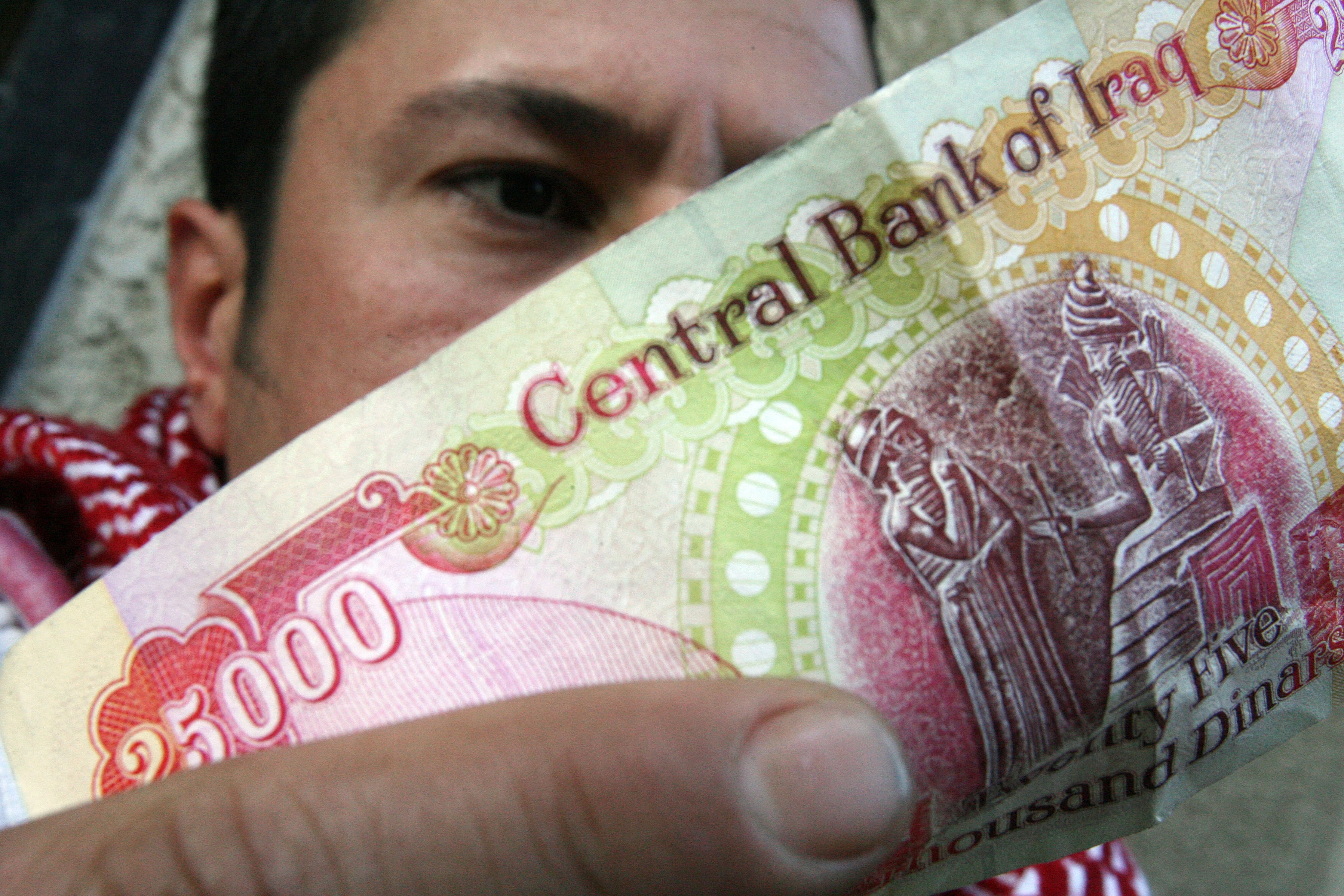 Iraq's problems are rooted in corruption, not currency