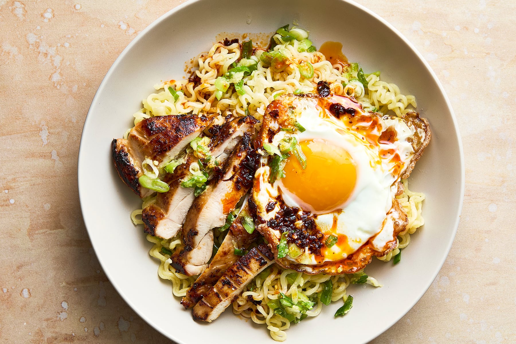 Sesame soy chicken with ginger-scallion noodles