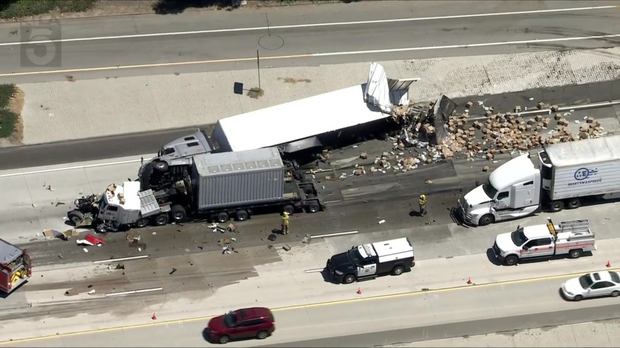 Crash involving 2 big rigs sends boxes spilling across 210 Freeway in L.A. County