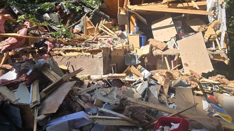 Barrow County resident rescued after oak tree falls on home, trapping her underneath roofing, limbs