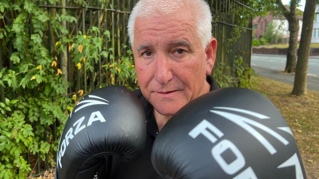 Council leader loses six stone to take on charity boxing match