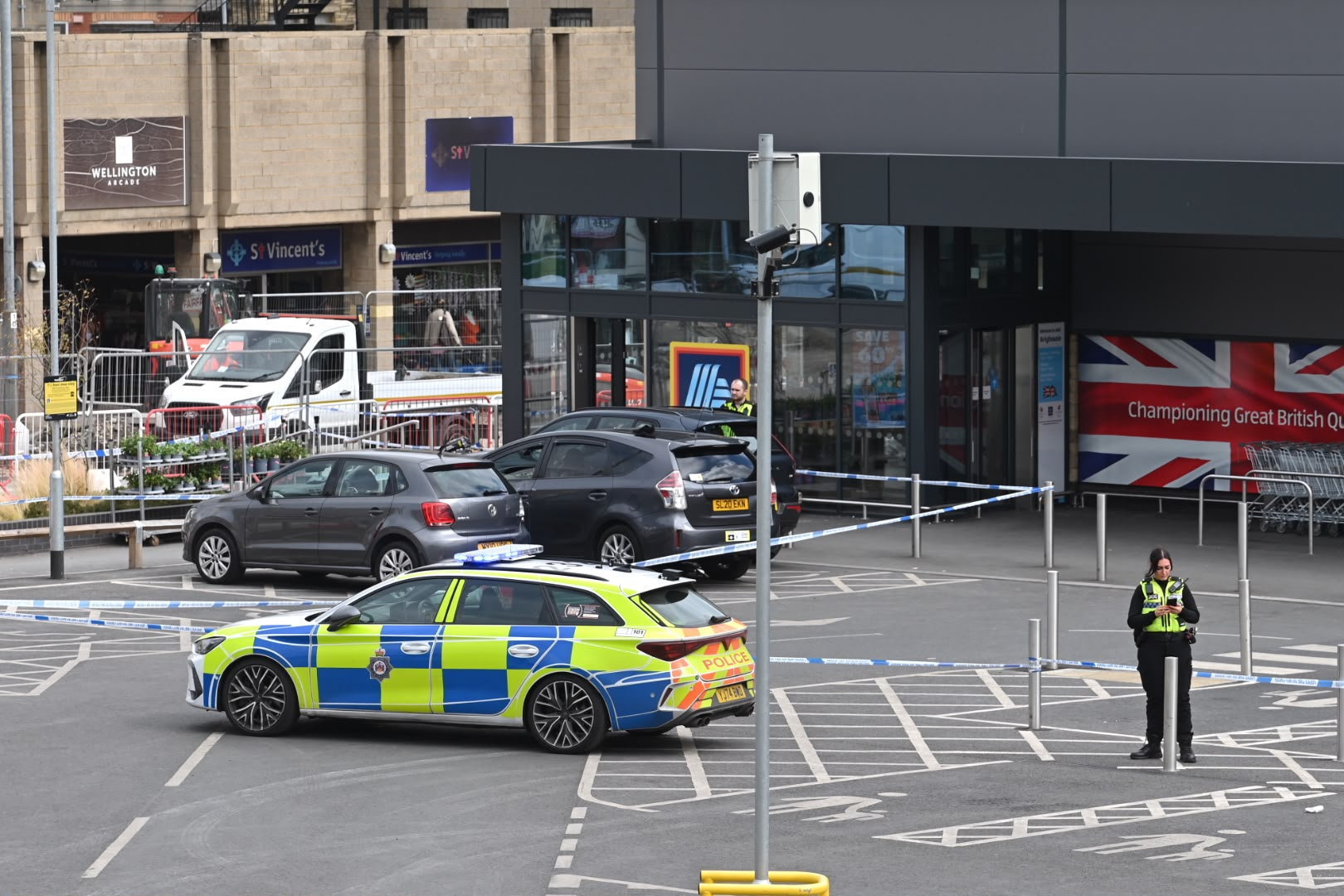 Grandad, 77, dies after being hit by vehicle in Aldi car park in front of horrified shoppers – as man, 46, arrested