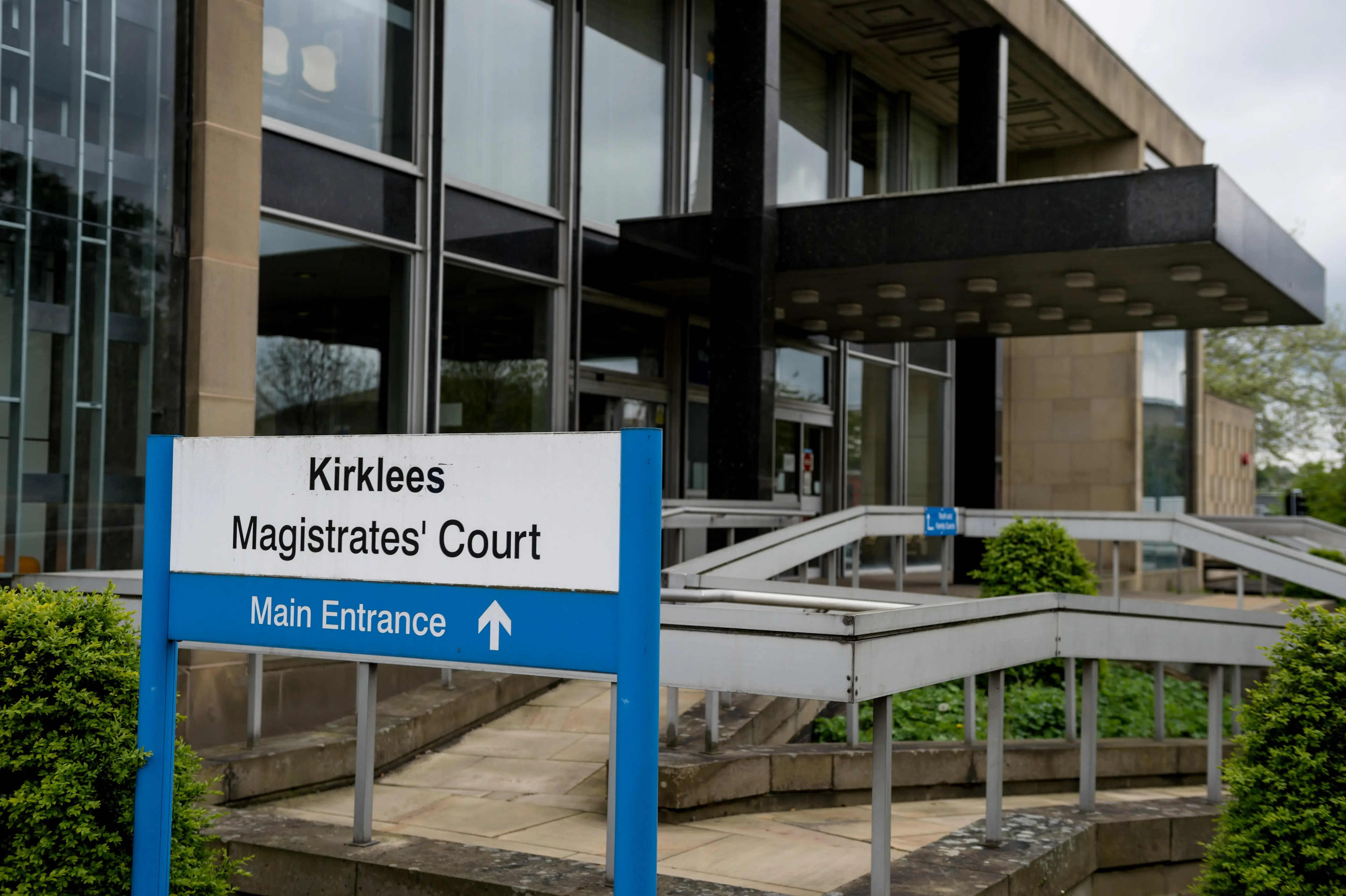 Four men charged with multiple counts of rape against three schoolgirls over two-year period