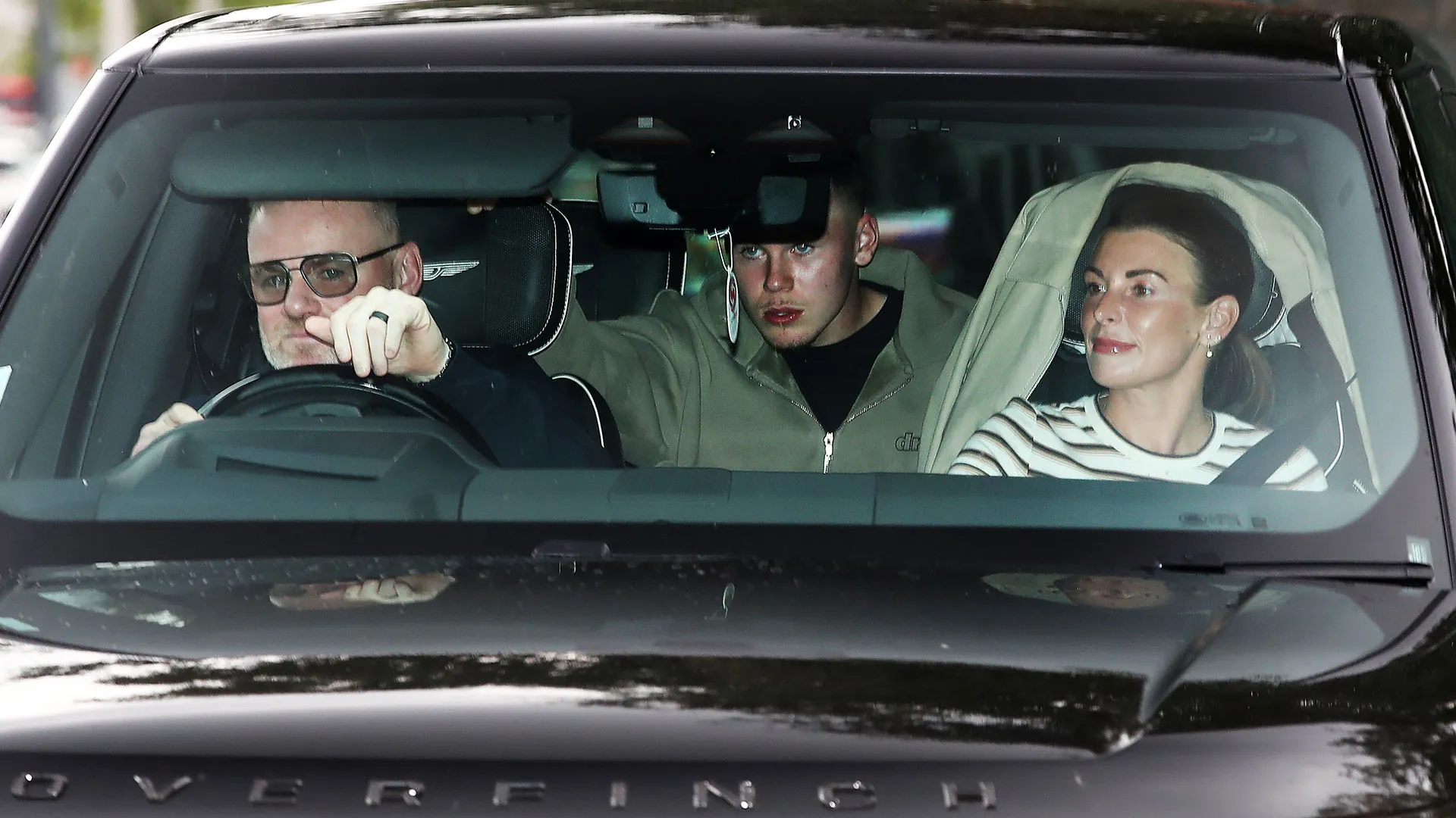 Wayne Rooney and Coleen drop Kai off at Man Utd training as Rashford and stars arrive at Carrington ahead of Hull clash