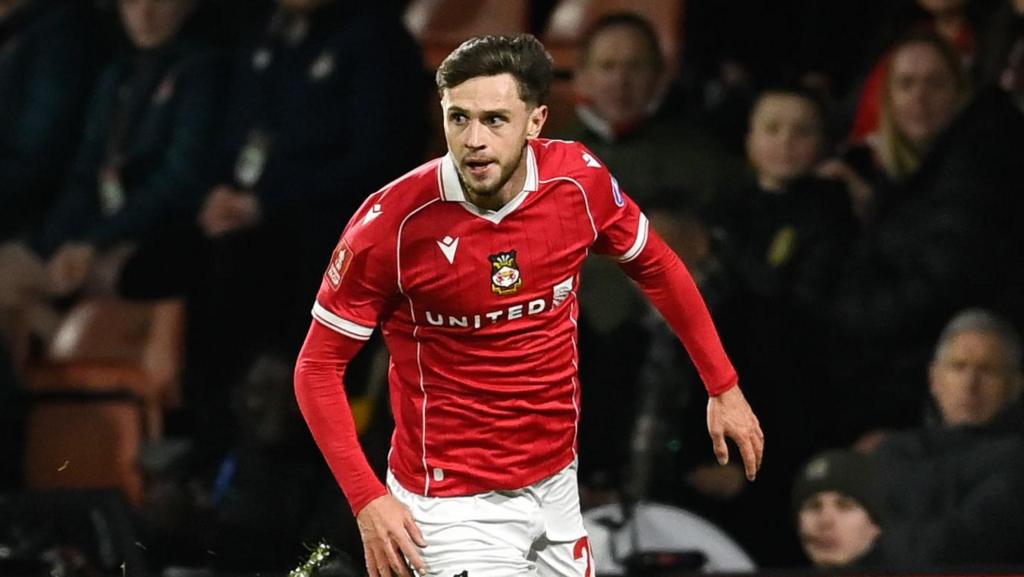 MK Dons sign Barnett on loan from Wrexham