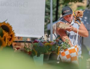 Photo of the day: Multi-tasking at the market