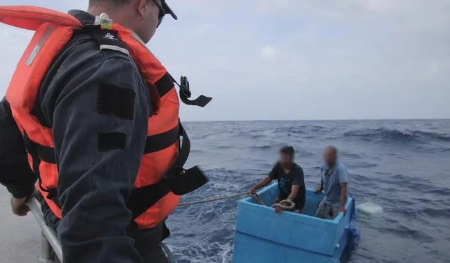 Moment two missing fishermen are found inside giant cooler after boat sank leaving them stranded at sea for five days