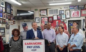 Jackson reveals affordability plan while defending business dealings with state