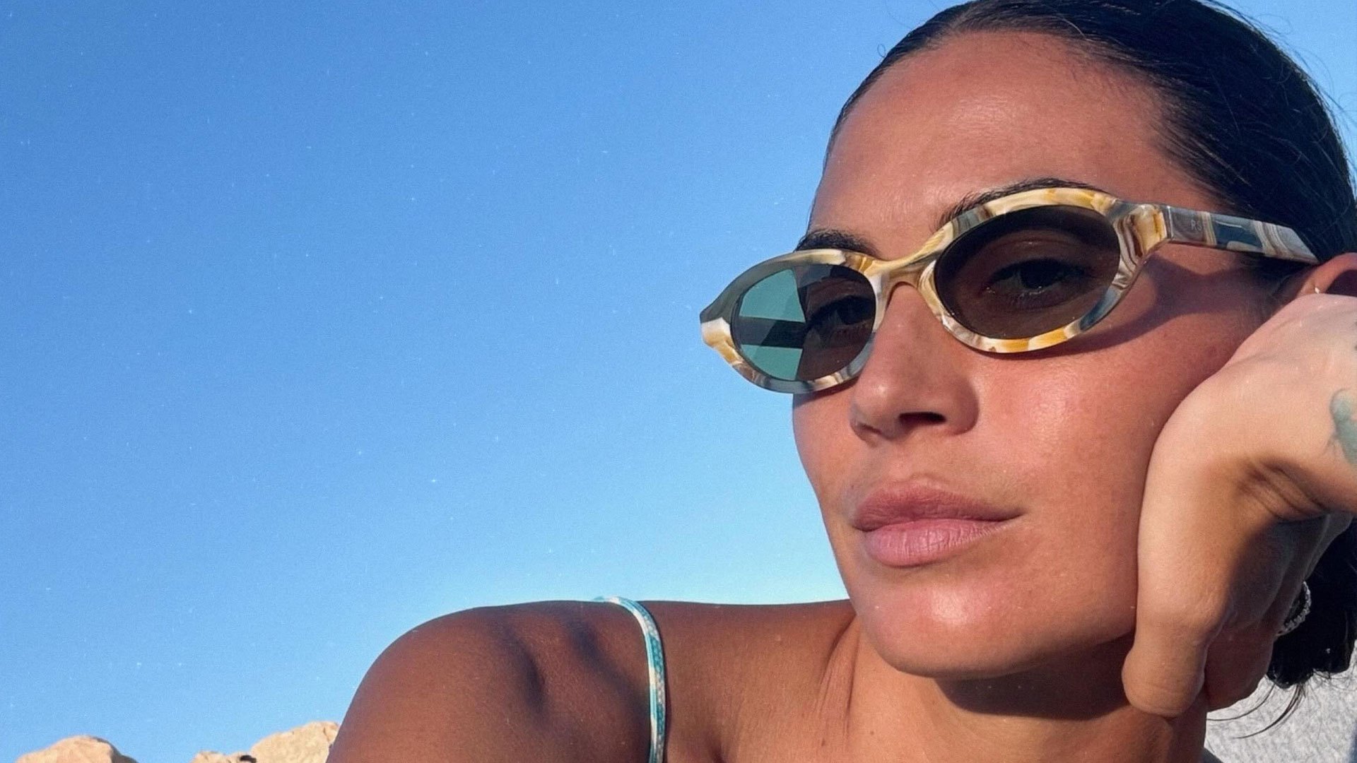 Sex-mad former Barcelona wag stuns in blue and white bikini as fans label her ‘the most beautiful of all’