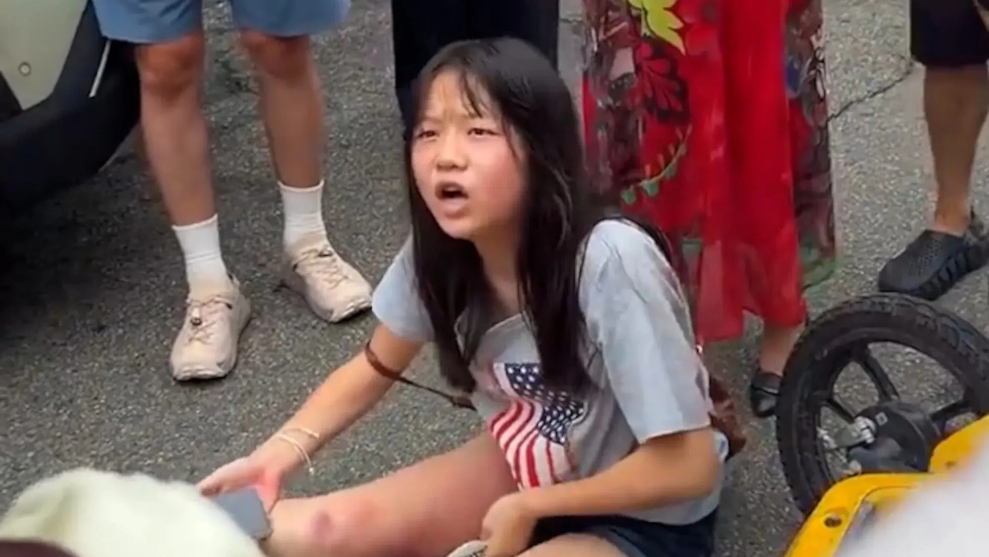 Incredible moment crowd of strangers rescue girl, 14, trapped underneath wheels of car after crash
