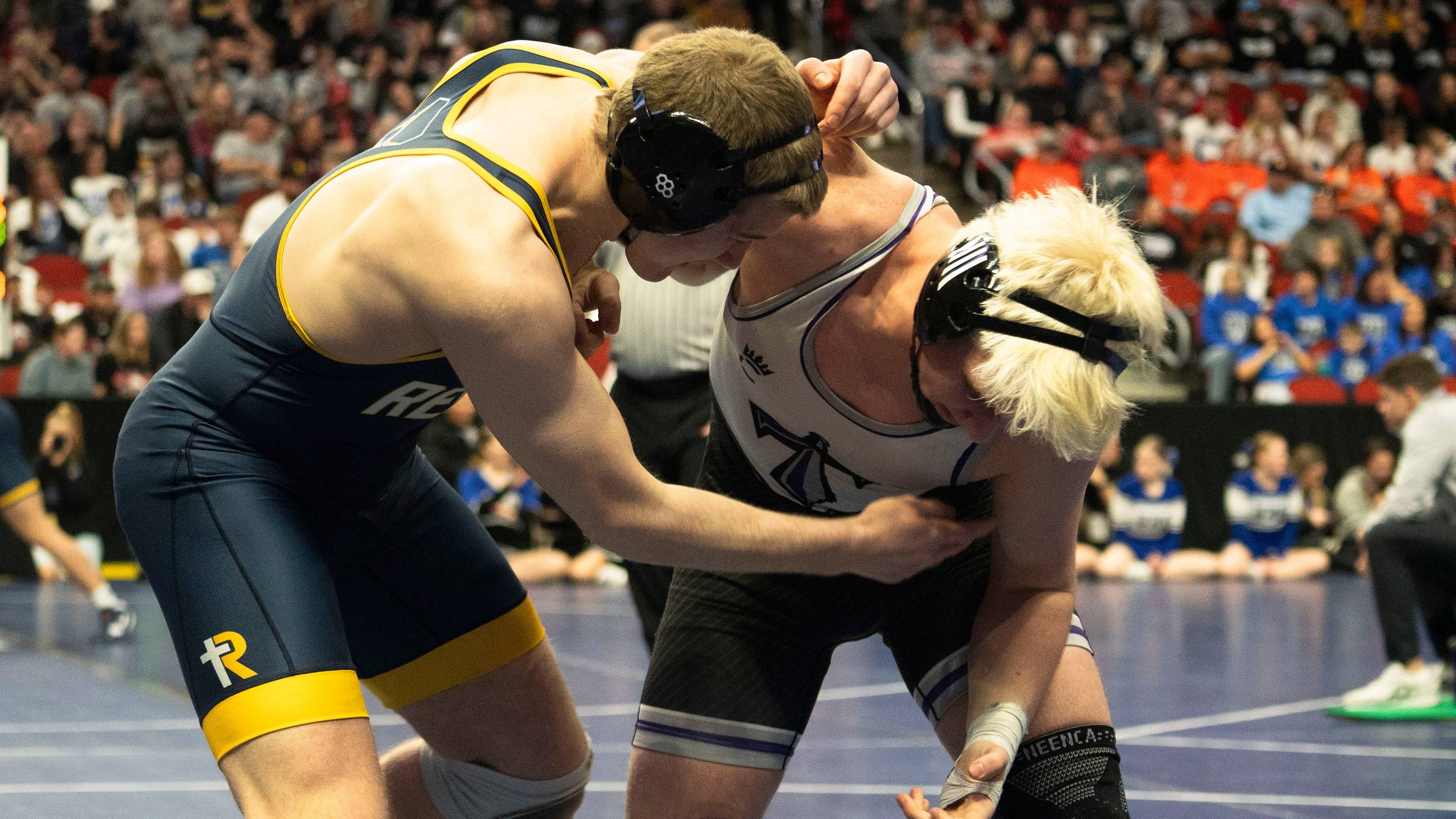 Former Iowa High School State Wrestling Champion Takes Over Program