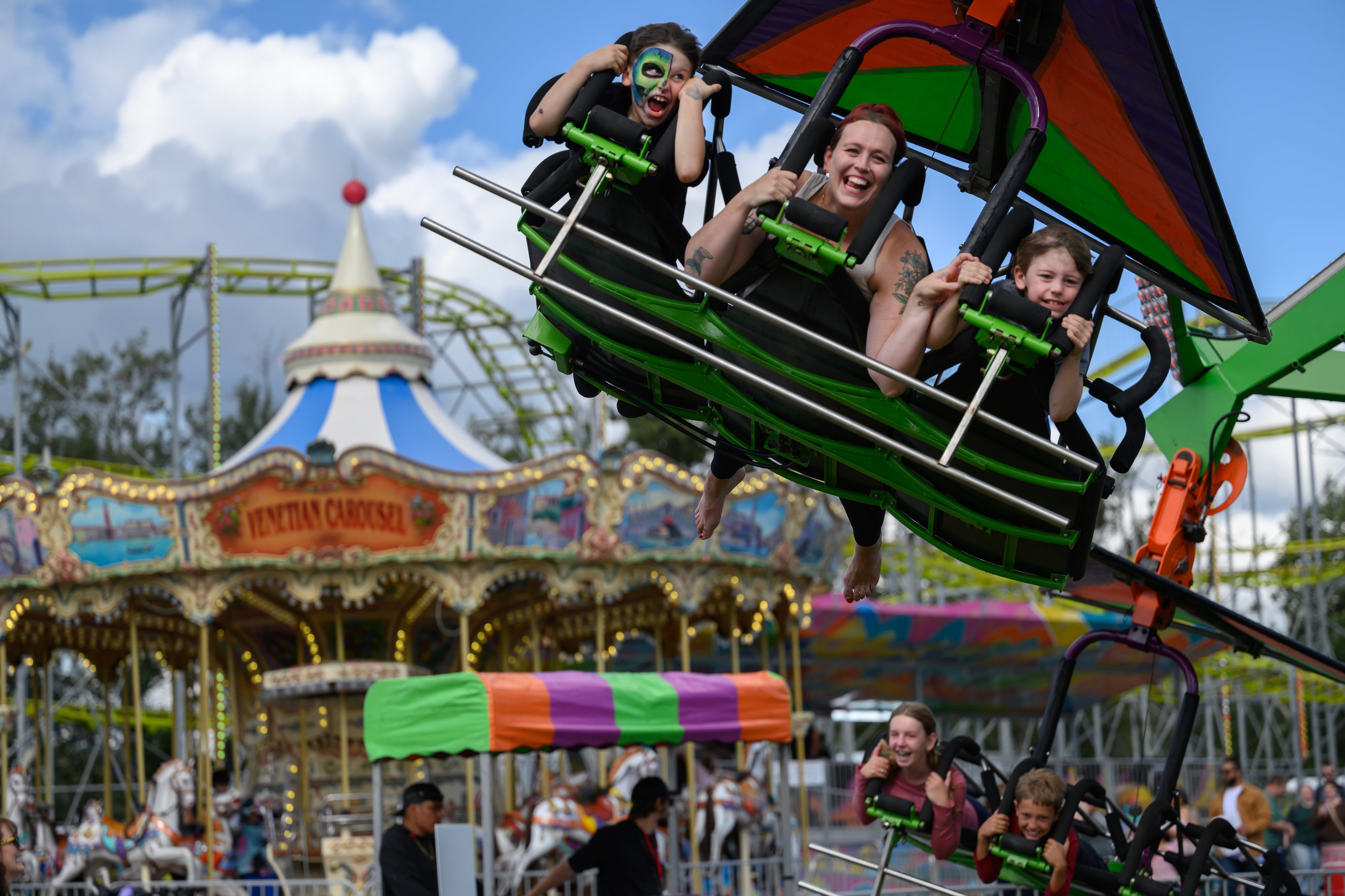 Friends and families make memories on the first day of the Alaska State Fair