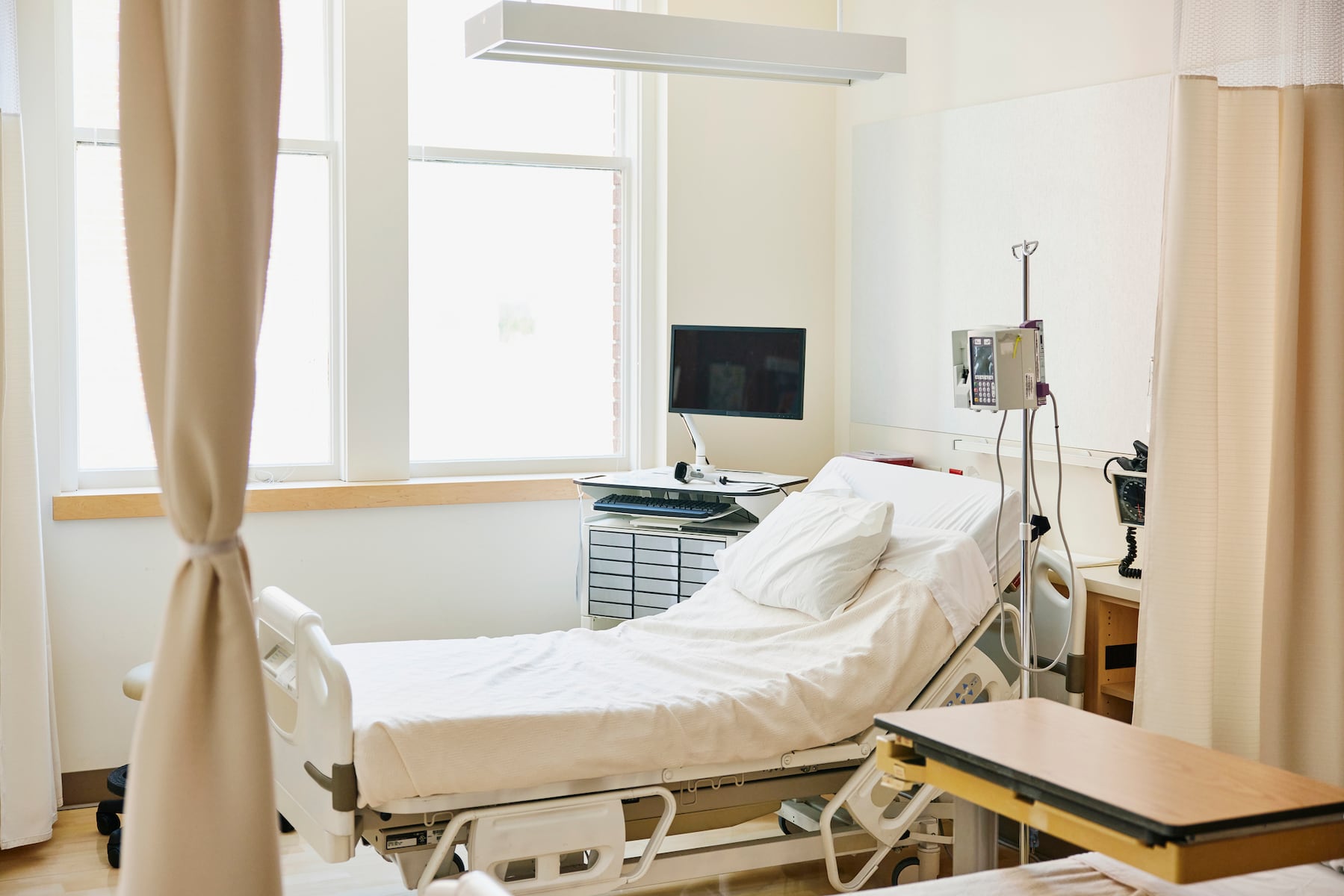 Beloved musician wakes from medically induced coma, faces 2 major surgeries