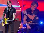 Keith Urban performs song about an ex whose found 'somebody else' before tearing up in front of fans at concert... amid Nicole Kidman's rumored new romance